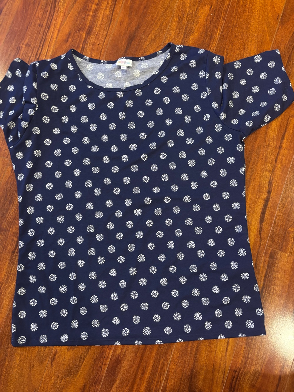 LuLaRoe Navy Blue Short Sleeve Tee with White Dot Floral Print